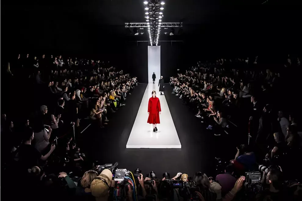 Fashion Week — runway lighting and audience